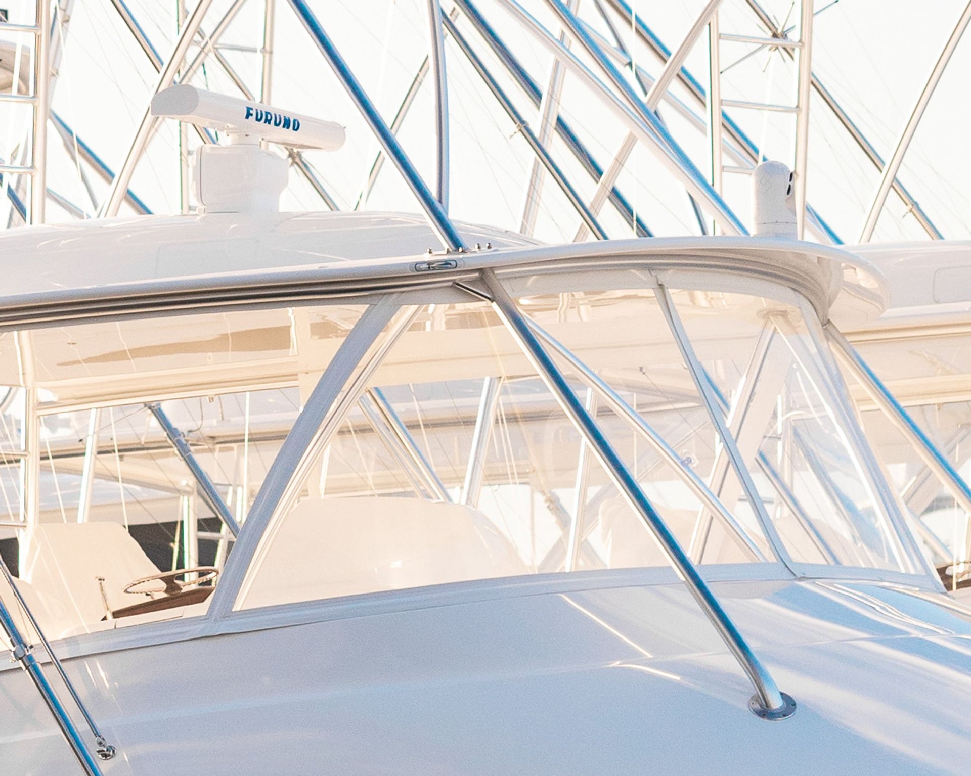 Clear vinyl panels enclosing the helm of a boat
