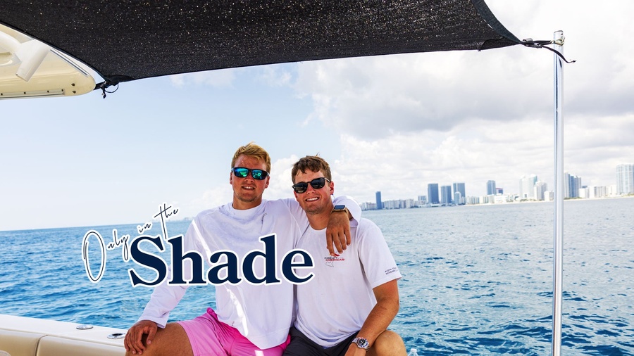 Two anglers in the shade of the Bimini T