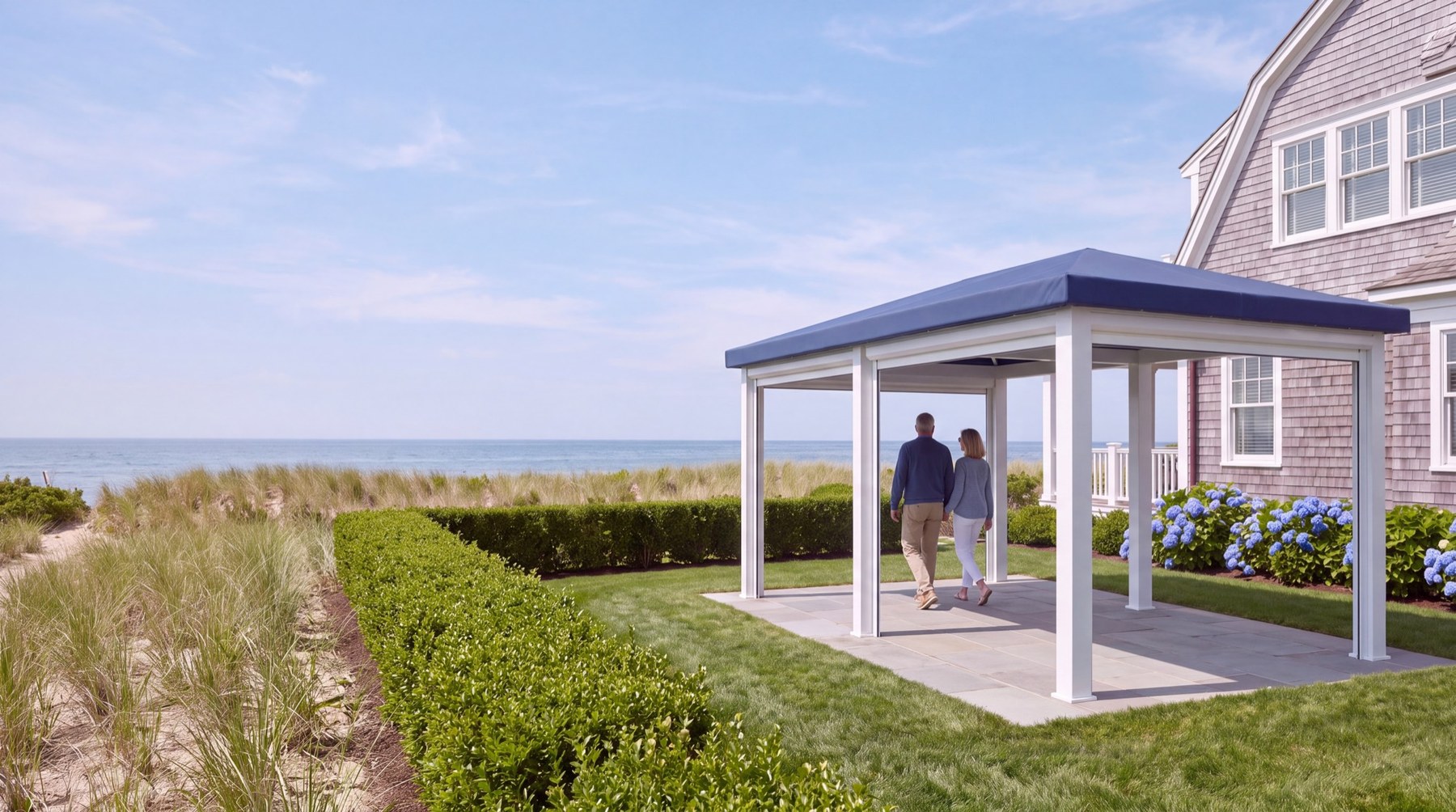 An open Haven with a navy top on a dune above the beach
