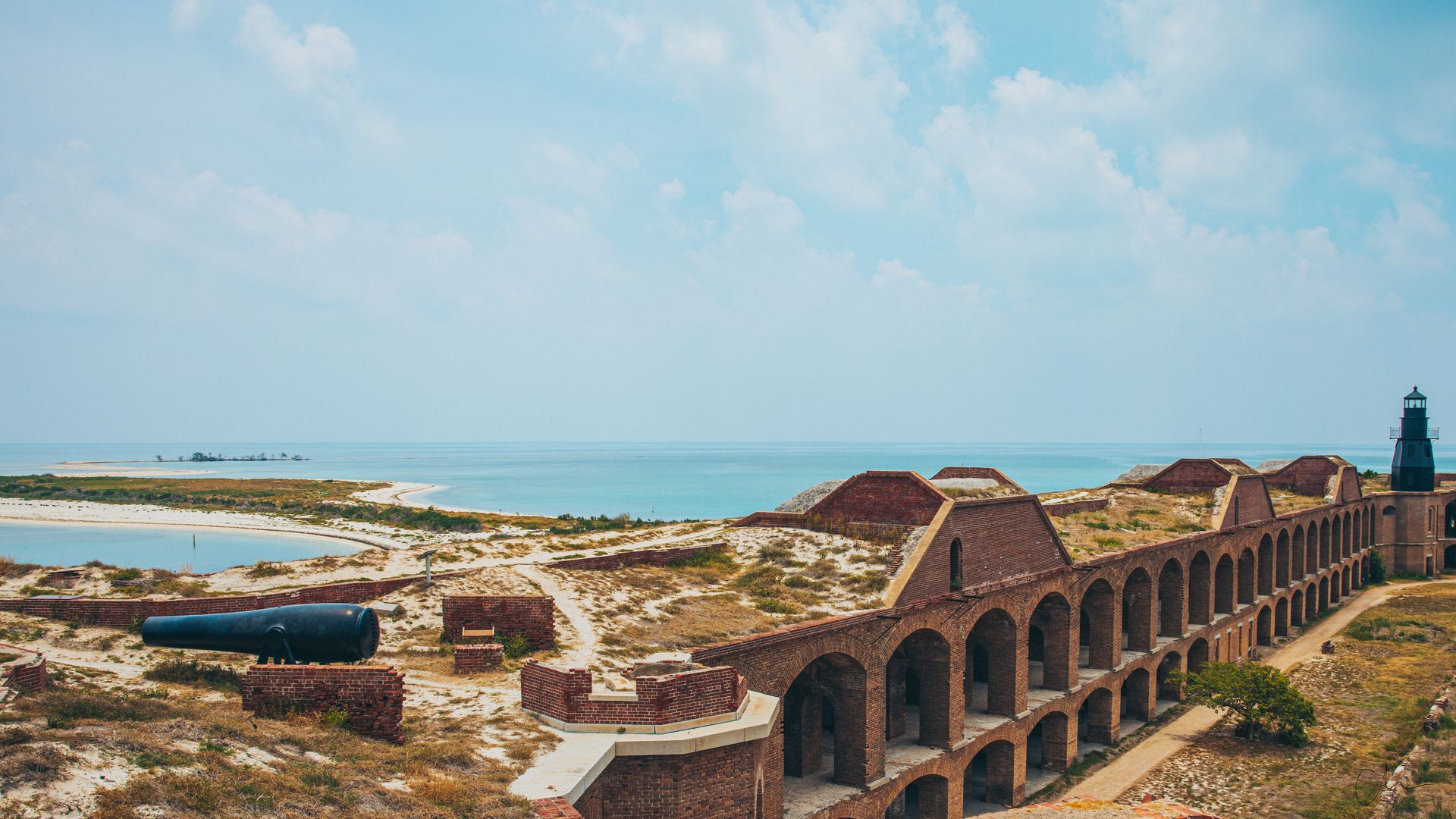 Fort Jefferson's brick ramparts, cannon and lighthouse at Dry Tortugas