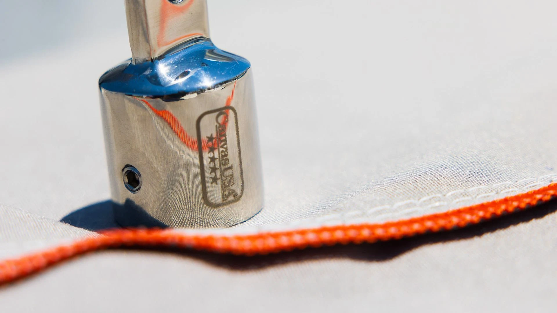 Stainless eye end fitting engraved with the Canvas USA® logo